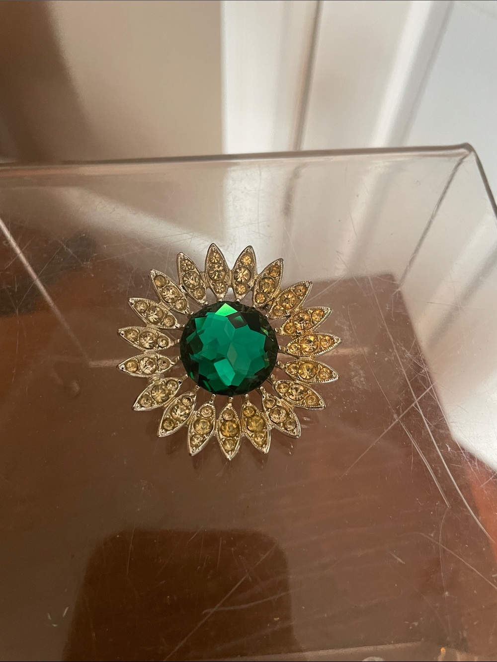 Sarah Coventry Gold-Tone Sunburst Brooch with Emerald Green Center